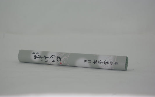 Roll of paper with calligraphy on a gray background