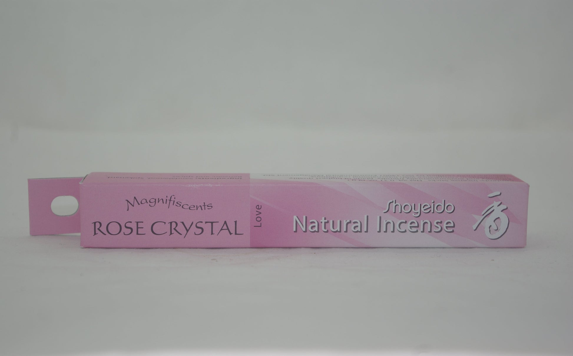 Pink box of Shoyeido Rose Crystal natural incense on a white background